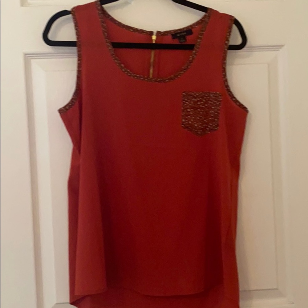 Rust colored tank with leopard/cheetah print